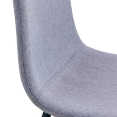 Table and chair set.A Modern Minimalist Circular Dining Table With A