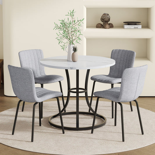 Table and chair set.A Modern Minimalist Circular Dining Table With A