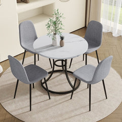 Table and chair set.A Modern Minimalist Circular Dining Table With A
