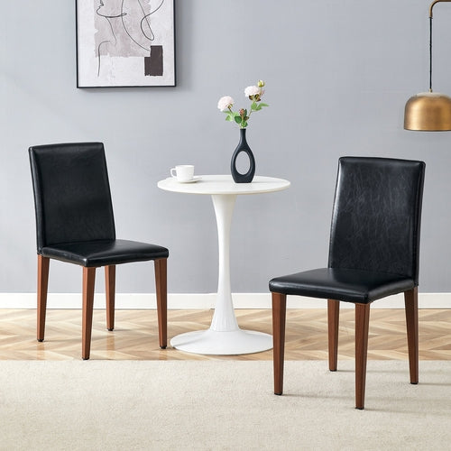 Two black PU dining chairs, simple and versatile, comfortable and