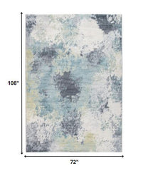 6' X 9' Blue and Ivory Abstract Area Rug