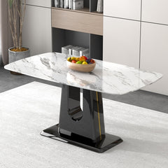 A modern, minimalist, and luxurious dining table with a white