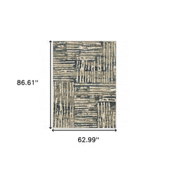 5' X 7' Blue And Beige Abstract Power Loom Stain Resistant Area Rug