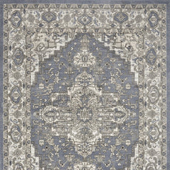 5' X 7' Blue and Ivory Medallion Power Loom Distressed Area Rug