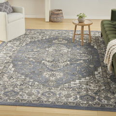5' X 7' Blue and Ivory Medallion Power Loom Distressed Area Rug
