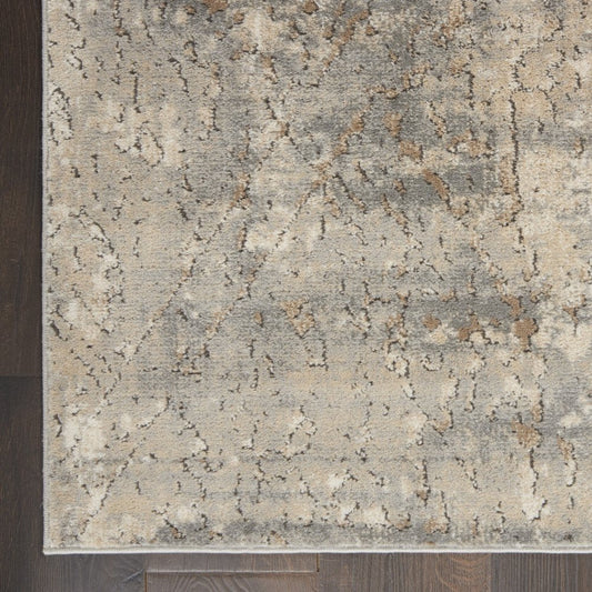 7' X 10' Beige and Gray Abstract Power Loom Area Rug