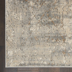 7' X 10' Beige and Gray Abstract Power Loom Area Rug