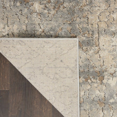 7' X 10' Beige and Gray Abstract Power Loom Area Rug