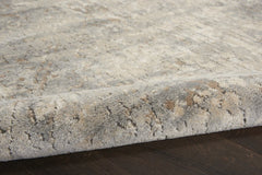 7' X 10' Beige and Gray Abstract Power Loom Area Rug