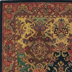 4' X 6' Tan Black and Red Wool Floral Area Rug