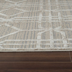 5' X 8' Beige and Brown Abstract Distressed Area Rug