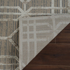 5' X 8' Beige and Brown Abstract Distressed Area Rug