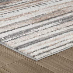 5' X 8' Beige and Gray Abstract Worn Faded Area Rug
