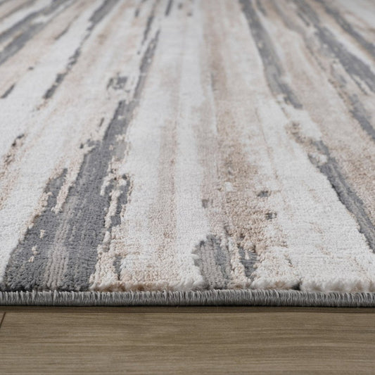 5' X 8' Beige and Gray Abstract Worn Faded Area Rug