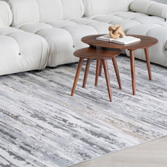 5' X 8' Beige and Gray Abstract Worn Faded Area Rug