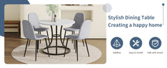 Table and chair set.A Modern Minimalist Circular Dining Table With A
