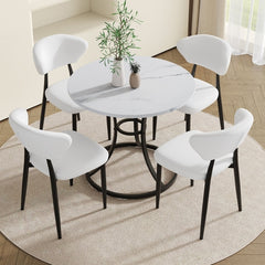 Table and chair set.A Modern Minimalist Circular Dining Table With A