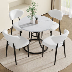Table and chair set.A Modern Minimalist Circular Dining Table With A