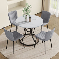 Table and chair set.A Modern Minimalist Circular Dining Table With A
