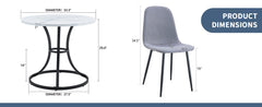 Table and chair set.A Modern Minimalist Circular Dining Table With A