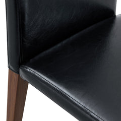 Two black PU dining chairs, simple and versatile, comfortable and