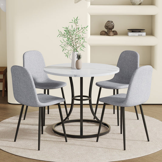 Table and chair set.A Modern Minimalist Circular Dining Table With A